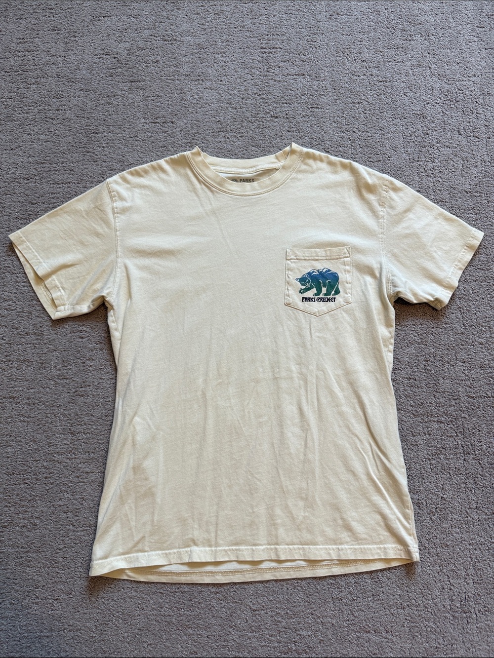Parks Project Cream Pocket Tee with Blue and Green Bear